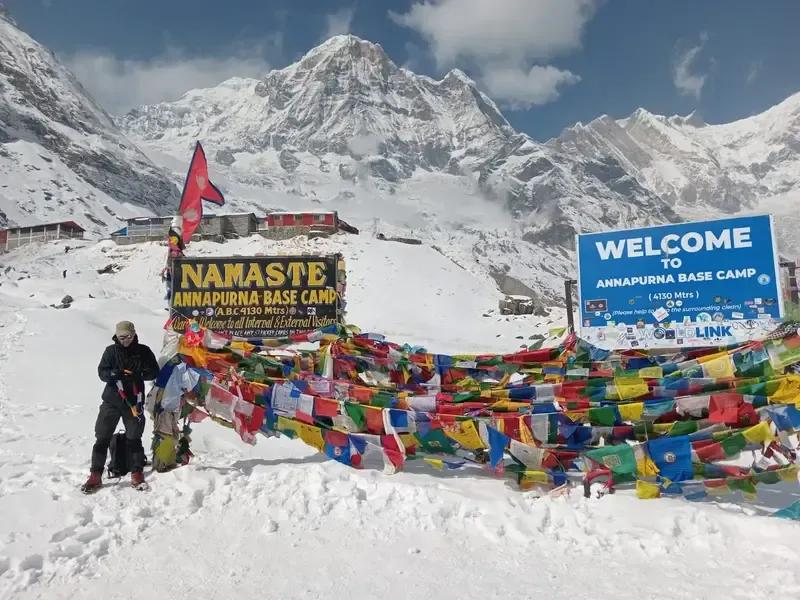 Annapurna Base Camp Trek Welcome Board and Colorful Prayer flags
